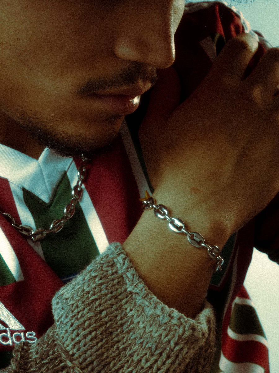 Model is wearing an adjustable bracelet