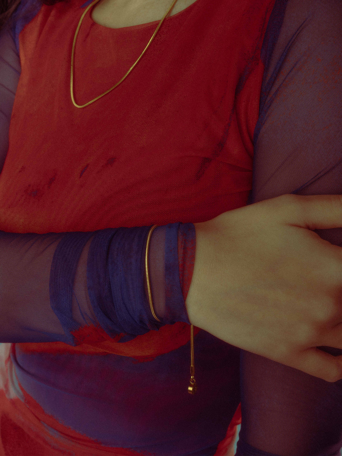 Model is wearing an adjustable bracelet