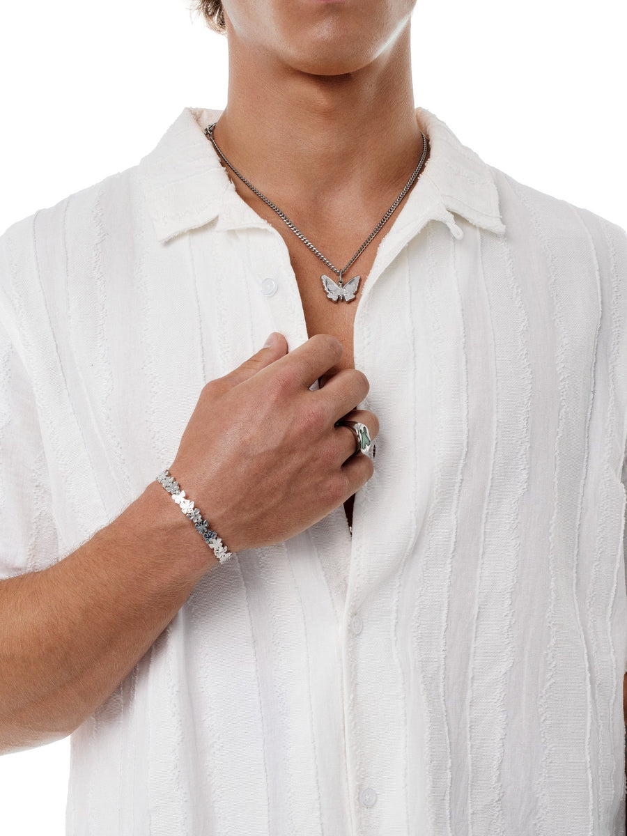 Petal Cuff shown with the Butterfly Effect necklace