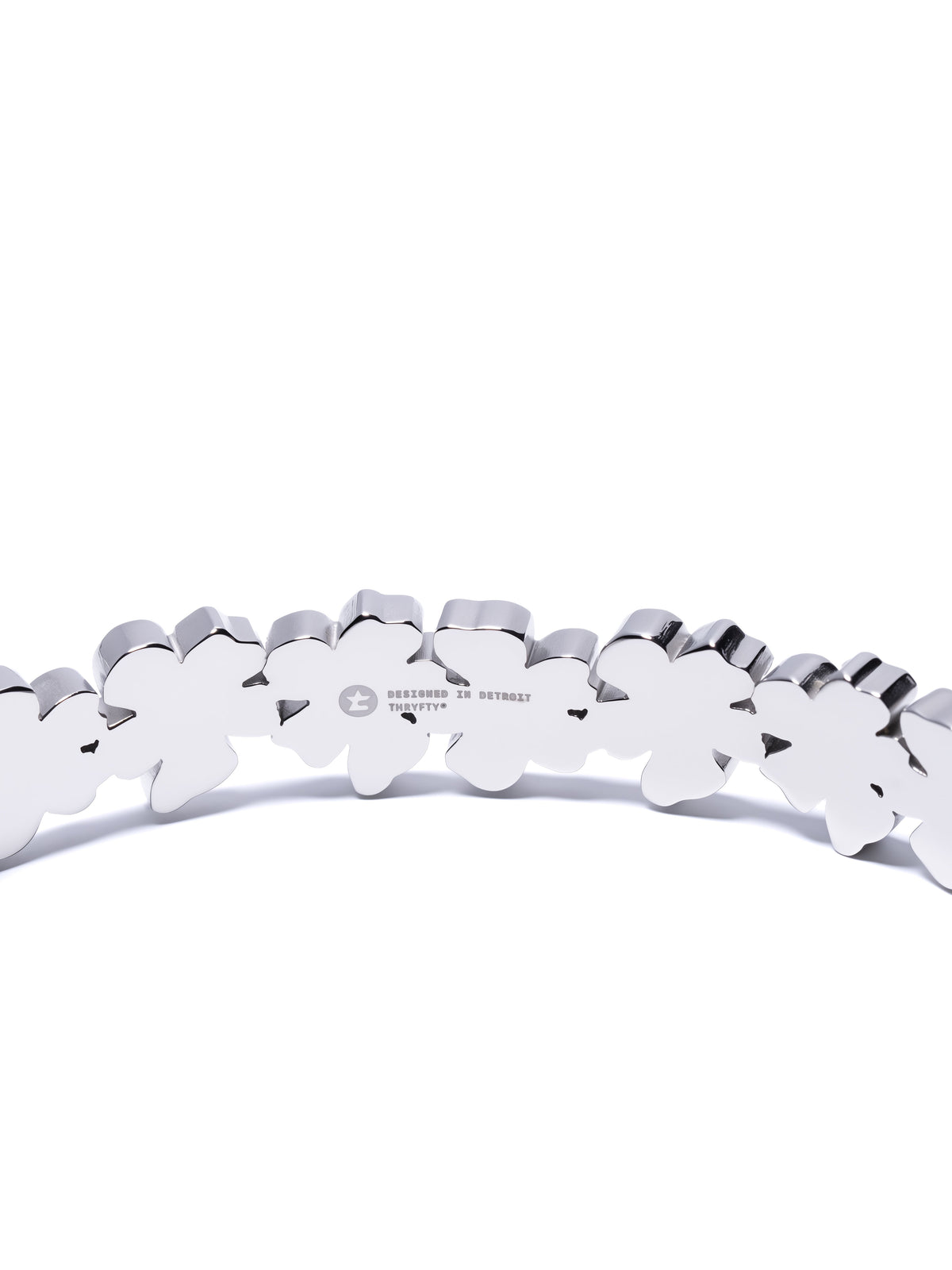 Petal Cuff bracelet top view with engraved logo